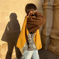 Bolso combinado serpiente mostaza