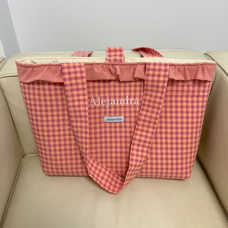 Bolso shopper fina con volante alrededor