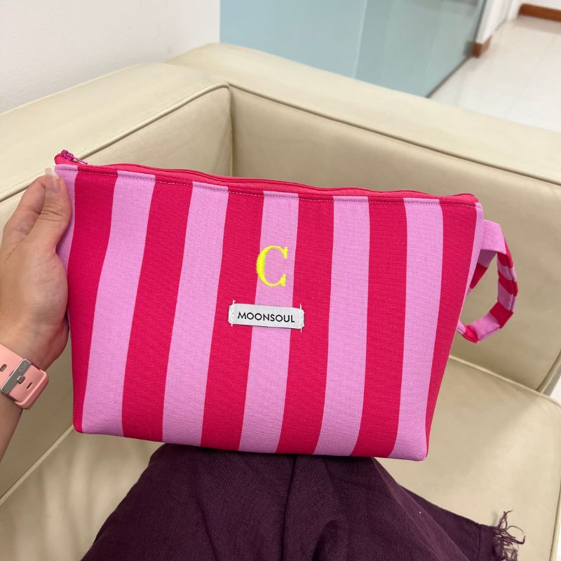 Neceser Essential rayas fucsia y rosa